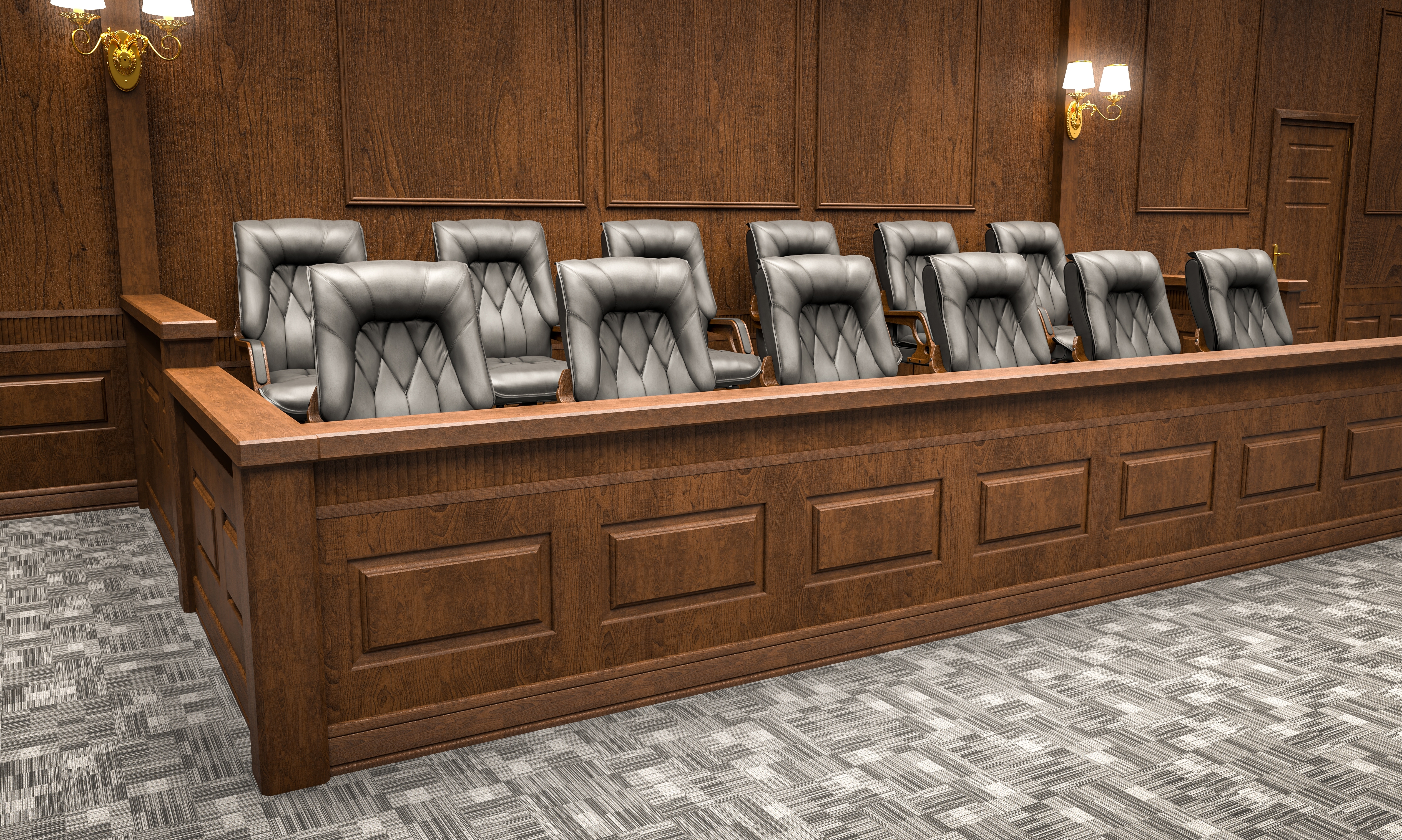 Empty jury box in a courtroom.